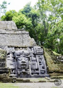 A large stone Mayan mask at the Lamanai Mayan Ruins in Belize.