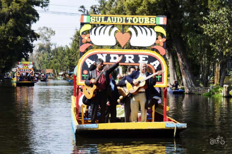 A mariachi band performs on a boat at Xochimilco.