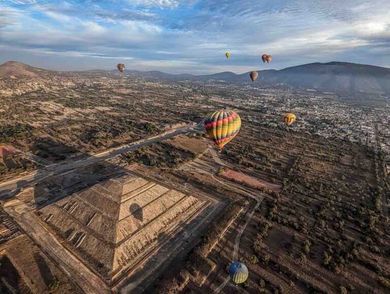 Hot air balloon flying over Teotihuacan's Pyramid of the Sun.