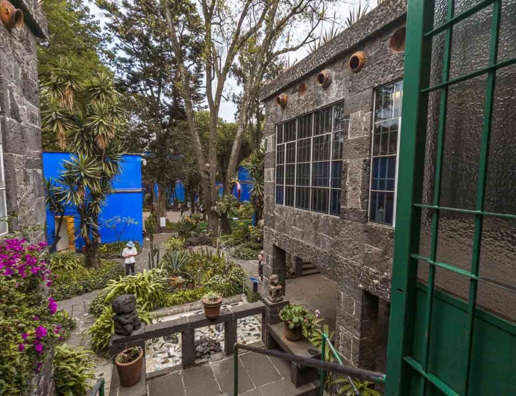 Exterior view of the Terrace at the Frida Kahlo Museum in Mexico City, showcasing the garden in museum.