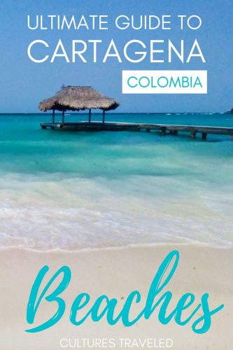 Image of turquoise ocean and sand with a long dock, with the words Ultimate Guide to Cartagena Colombia Beaches on top.