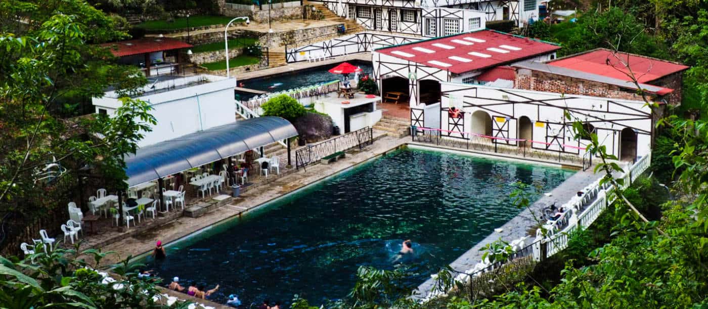 Overhead view of the large thermal pool and hotel at Termales Los Volcanes