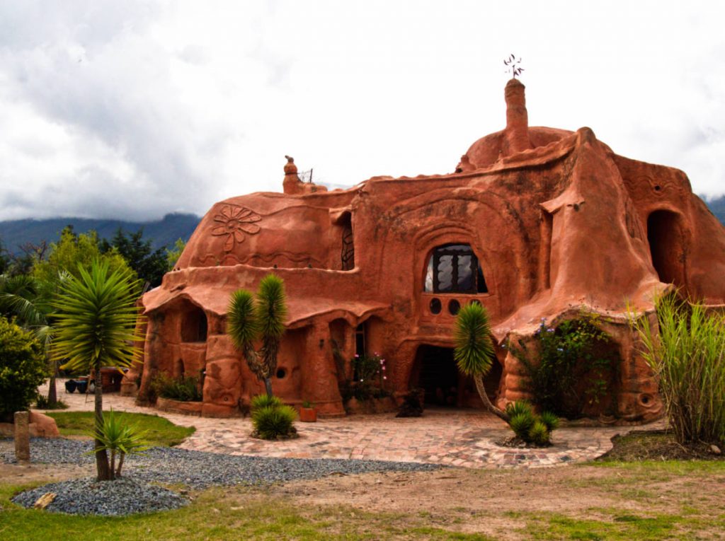 An overall view of Casa Terracota in Villa de Leyva. Strange shapes and contours stick out of this house made entirely of clay.