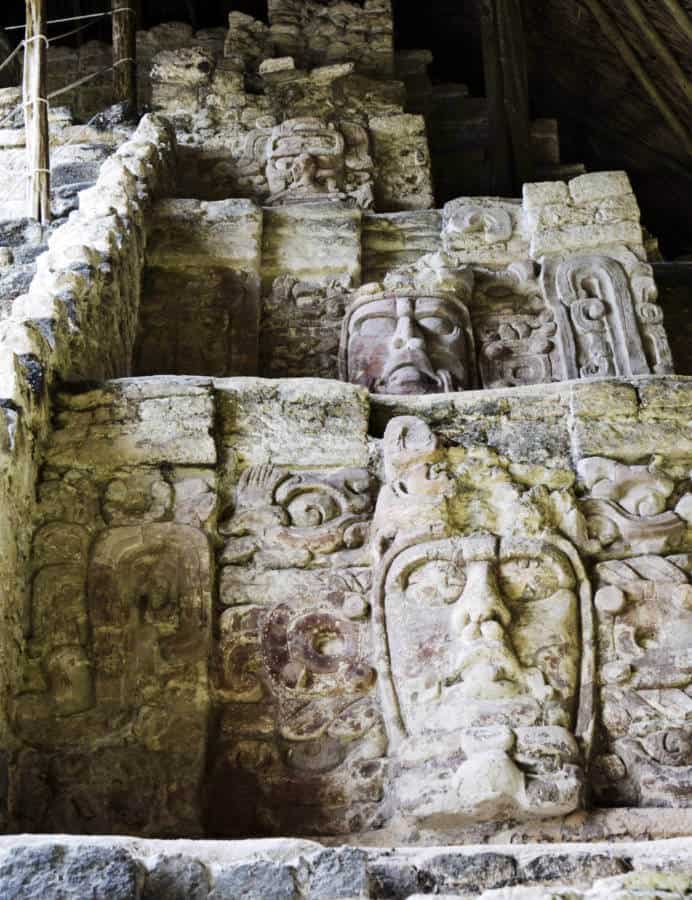 Stone carved masks at Kohunlich Mayan Ruins in the southern Yucatan Peninsula.