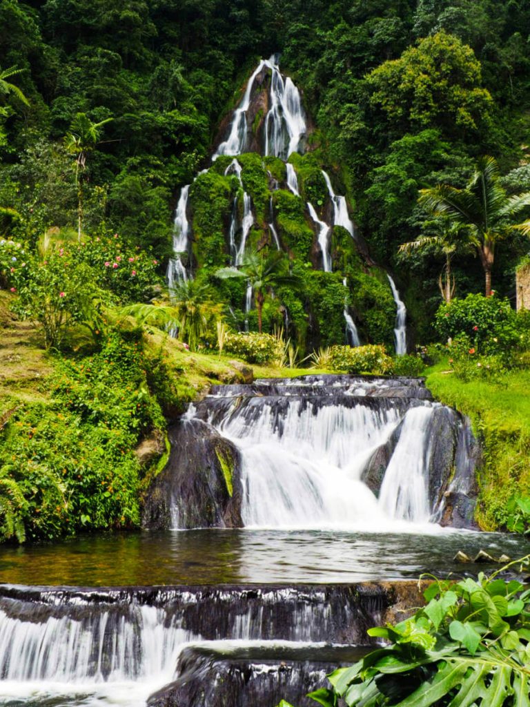 A the Santa Rosa de Cabal hot springs, water cascades down the mountain and to the river streams below.